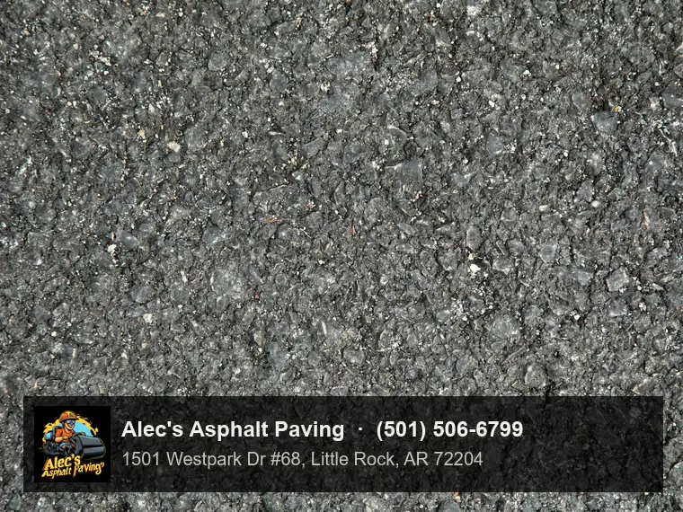 Close view of the aggregate in a worn asphalt surface